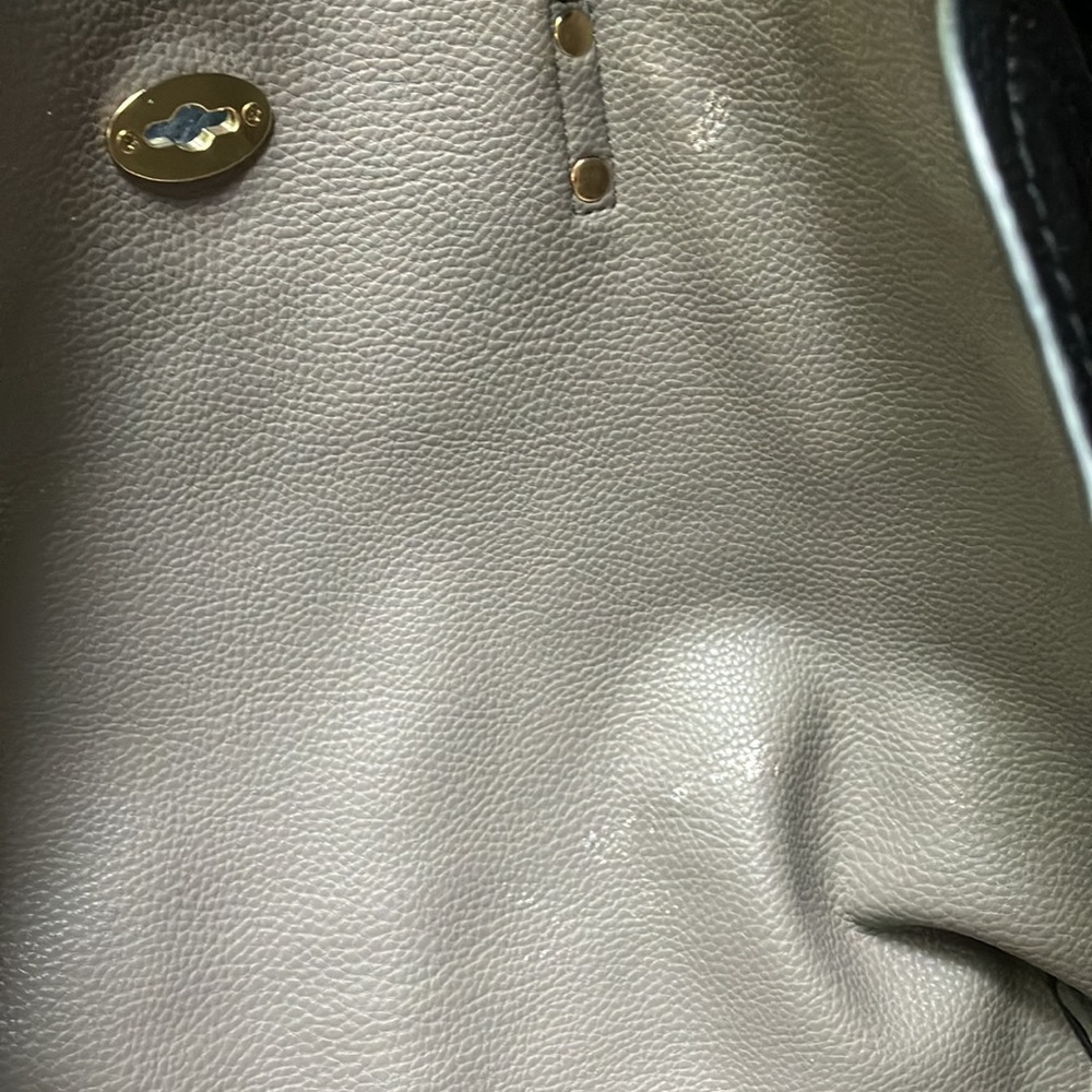 BCBG PARIS BLACK & GOLD TOTE WITH TURN BUTTON FASTENER WITH TAUPE LINING - Picture 9 of 9